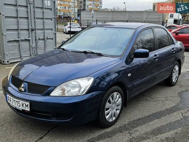 Синий Мицубиси Лансер, объемом двигателя 1.62 л и пробегом 114 тыс. км за 5200 $, фото 1 на Automoto.ua