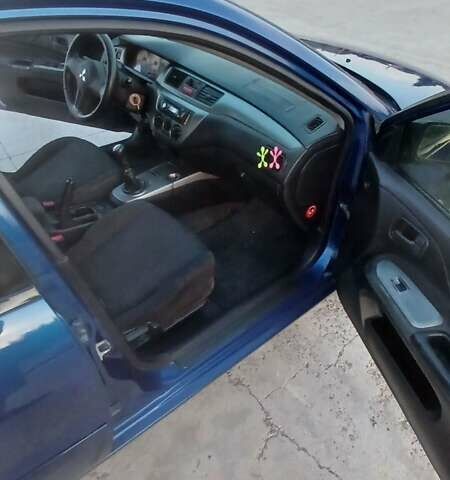 Синий Мицубиси Лансер, объемом двигателя 1.6 л и пробегом 263 тыс. км за 3400 $, фото 8 на Automoto.ua