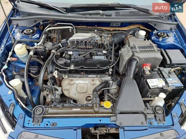 Синий Мицубиси Лансер, объемом двигателя 1.6 л и пробегом 222 тыс. км за 4599 $, фото 14 на Automoto.ua