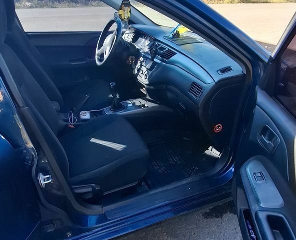 Синій Міцубісі Lancer, об'ємом двигуна 1.6 л та пробігом 267 тис. км за 3700 $, фото 12 на Automoto.ua