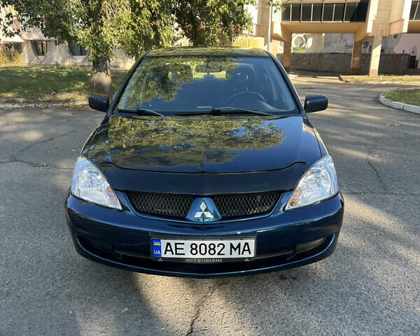 Міцубісі Lancer 2006 у Дніпро (Дніпропетровську) на Automoto.ua Синій Міцубісі Lancer, об'ємом двигуна 1.58 л та пробігом 284 тис. км за 4500 $, фото 6 на Automoto.ua