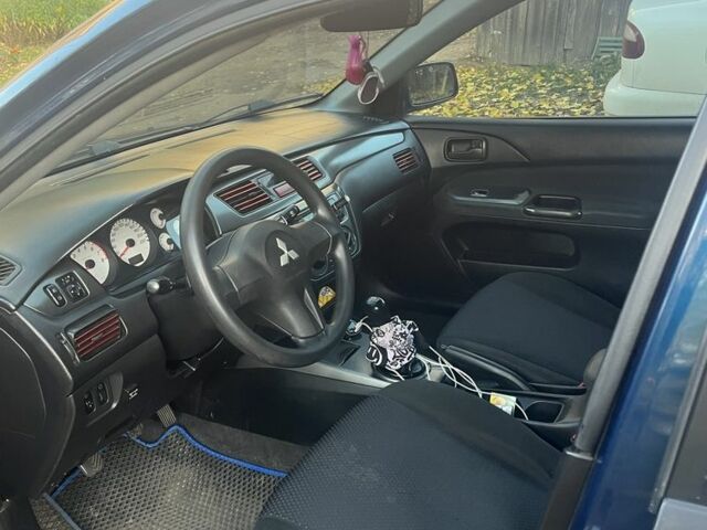 Синій Міцубісі Lancer, об'ємом двигуна 1.6 л та пробігом 380 тис. км за 3600 $, фото 5 на Automoto.ua