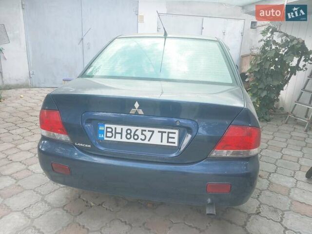 Синій Міцубісі Lancer, об'ємом двигуна 0 л та пробігом 243 тис. км за 5000 $, фото 1 на Automoto.ua