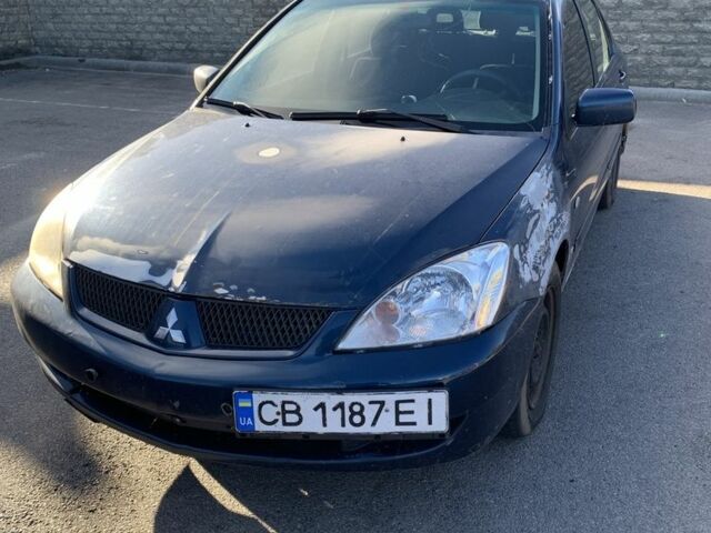 Синій Міцубісі Lancer, об'ємом двигуна 1.6 л та пробігом 242 тис. км за 2100 $, фото 1 на Automoto.ua