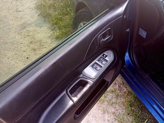 Синий Мицубиси Лансер, объемом двигателя 1.6 л и пробегом 305 тыс. км за 3500 $, фото 1 на Automoto.ua