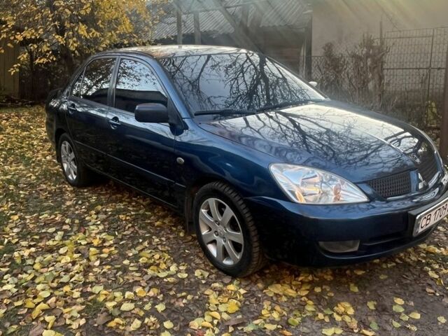 Синій Міцубісі Lancer, об'ємом двигуна 1.6 л та пробігом 380 тис. км за 3600 $, фото 1 на Automoto.ua