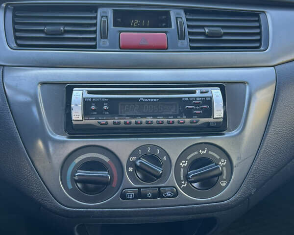 Міцубісі Lancer 2006 у Дніпро (Дніпропетровську) на Automoto.ua Синій Міцубісі Lancer, об'ємом двигуна 1.58 л та пробігом 284 тис. км за 4500 $, фото 13 на Automoto.ua