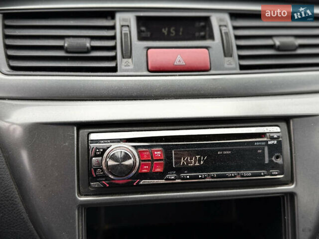 Синій Міцубісі Lancer, об'ємом двигуна 1.58 л та пробігом 513 тис. км за 2500 $, фото 21 на Automoto.ua