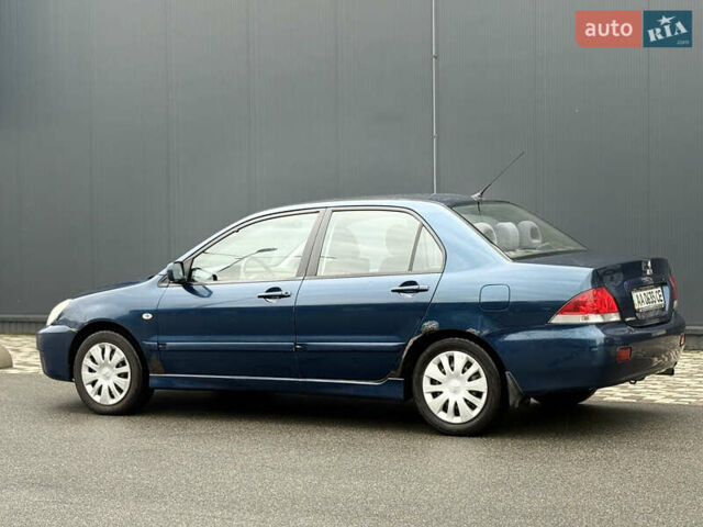 Синій Міцубісі Lancer, об'ємом двигуна 1.58 л та пробігом 513 тис. км за 2500 $, фото 6 на Automoto.ua