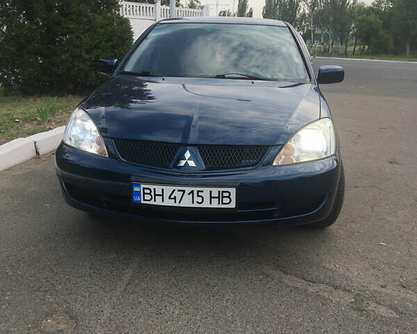 Синій Міцубісі Lancer, об'ємом двигуна 1.6 л та пробігом 169 тис. км за 5100 $, фото 6 на Automoto.ua