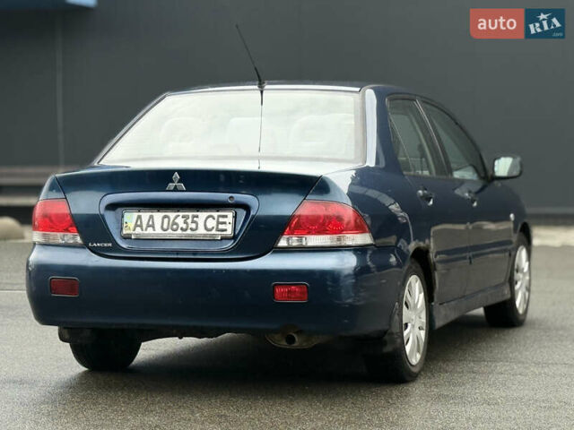 Синій Міцубісі Lancer, об'ємом двигуна 1.58 л та пробігом 513 тис. км за 2500 $, фото 15 на Automoto.ua