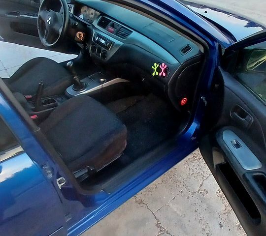 Синий Мицубиси Лансер, объемом двигателя 1.6 л и пробегом 0 тыс. км за 3500 $, фото 5 на Automoto.ua