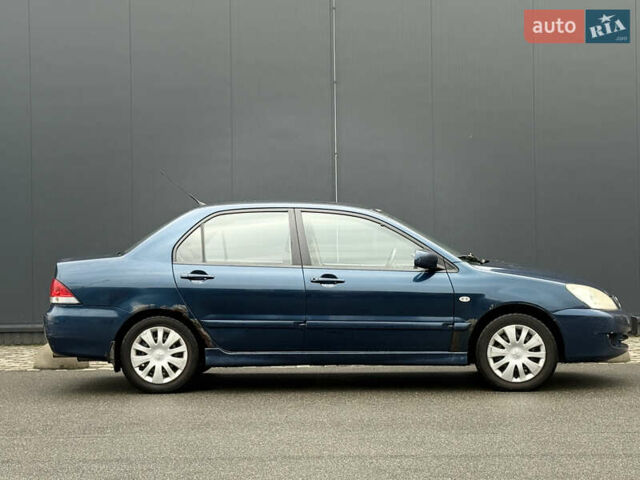 Синій Міцубісі Lancer, об'ємом двигуна 1.58 л та пробігом 513 тис. км за 2500 $, фото 12 на Automoto.ua