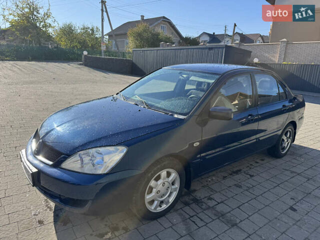 Синій Міцубісі Lancer, об'ємом двигуна 1.6 л та пробігом 148 тис. км за 3000 $, фото 1 на Automoto.ua