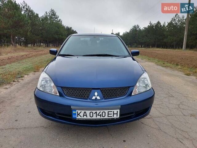 Синий Мицубиси Лансер, объемом двигателя 1.6 л и пробегом 222 тыс. км за 4599 $, фото 8 на Automoto.ua