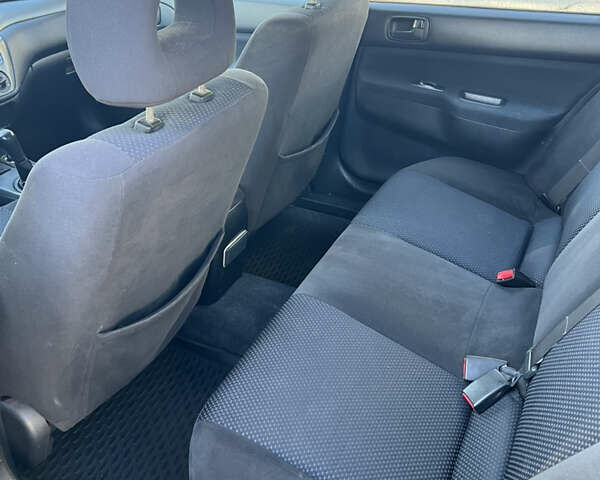 Міцубісі Lancer 2006 у Дніпро (Дніпропетровську) на Automoto.ua Синій Міцубісі Lancer, об'ємом двигуна 1.58 л та пробігом 284 тис. км за 4500 $, фото 9 на Automoto.ua