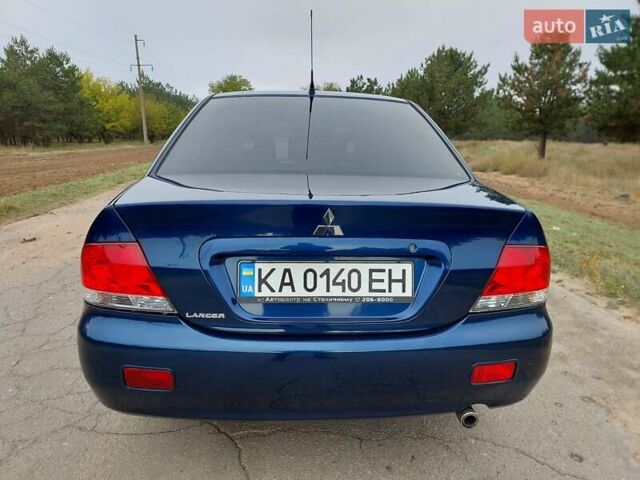 Синий Мицубиси Лансер, объемом двигателя 1.6 л и пробегом 222 тыс. км за 4599 $, фото 7 на Automoto.ua