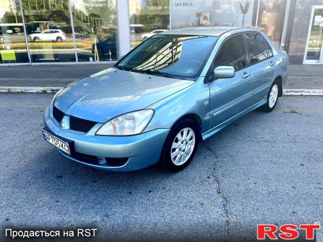 Синій Міцубісі Lancer, об'ємом двигуна 1.6 л та пробігом 273 тис. км за 3499 $, фото 1 на Automoto.ua