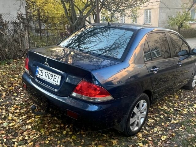 Синій Міцубісі Lancer, об'ємом двигуна 1.6 л та пробігом 380 тис. км за 3600 $, фото 2 на Automoto.ua
