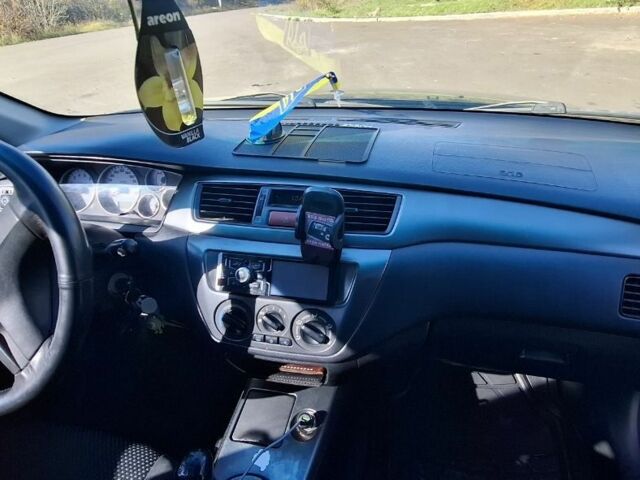 Синій Міцубісі Lancer, об'ємом двигуна 1.6 л та пробігом 267 тис. км за 3700 $, фото 8 на Automoto.ua