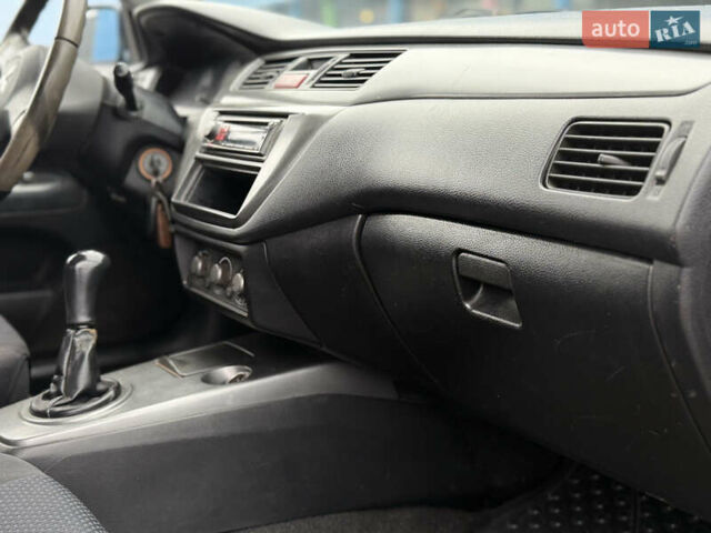 Синій Міцубісі Lancer, об'ємом двигуна 1.58 л та пробігом 513 тис. км за 2500 $, фото 23 на Automoto.ua