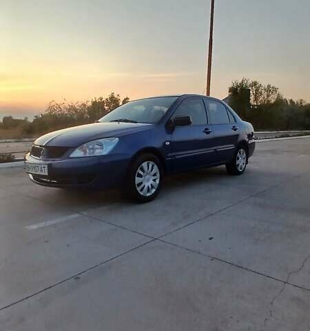 Синий Мицубиси Лансер, объемом двигателя 1.6 л и пробегом 263 тыс. км за 3400 $, фото 10 на Automoto.ua