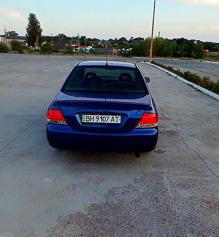 Синий Мицубиси Лансер, объемом двигателя 1.6 л и пробегом 0 тыс. км за 3500 $, фото 4 на Automoto.ua