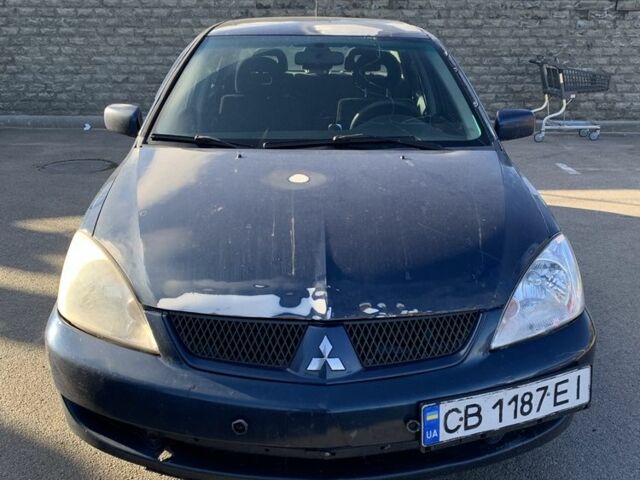 Синій Міцубісі Lancer, об'ємом двигуна 1.6 л та пробігом 242 тис. км за 2100 $, фото 2 на Automoto.ua