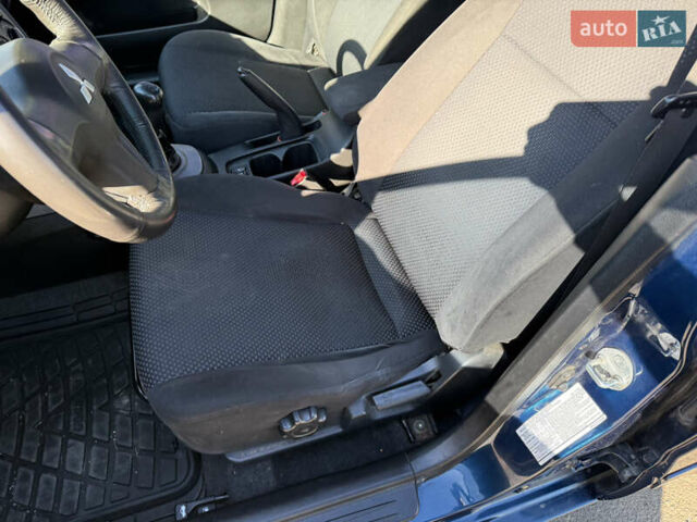 Синій Міцубісі Lancer, об'ємом двигуна 1.58 л та пробігом 269 тис. км за 3350 $, фото 11 на Automoto.ua