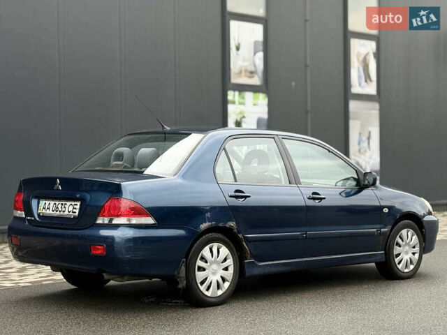 Синій Міцубісі Lancer, об'ємом двигуна 1.58 л та пробігом 513 тис. км за 2500 $, фото 11 на Automoto.ua