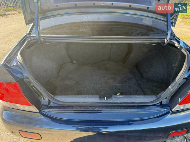 Синій Міцубісі Lancer, об'ємом двигуна 1.58 л та пробігом 269 тис. км за 3350 $, фото 19 на Automoto.ua