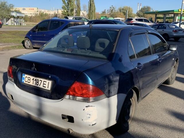 Синій Міцубісі Lancer, об'ємом двигуна 1.6 л та пробігом 242 тис. км за 2100 $, фото 3 на Automoto.ua