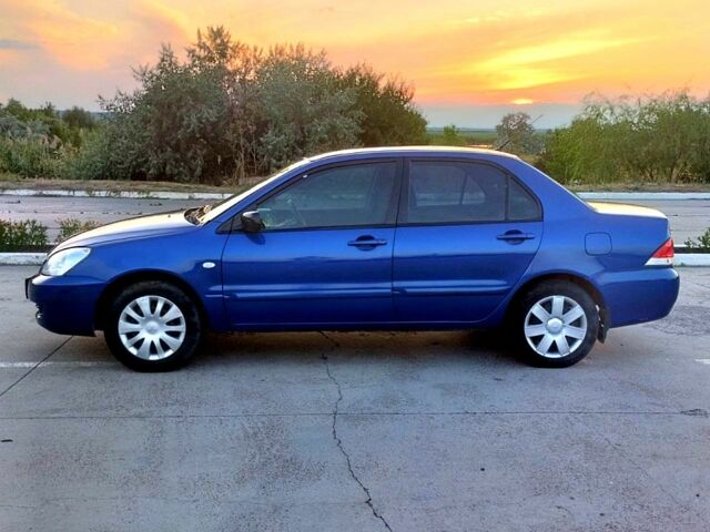 Синий Мицубиси Лансер, объемом двигателя 1.6 л и пробегом 0 тыс. км за 3500 $, фото 2 на Automoto.ua