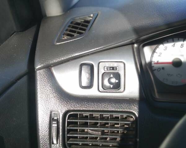 Синий Мицубиси Лансер, объемом двигателя 1.58 л и пробегом 195 тыс. км за 3990 $, фото 14 на Automoto.ua