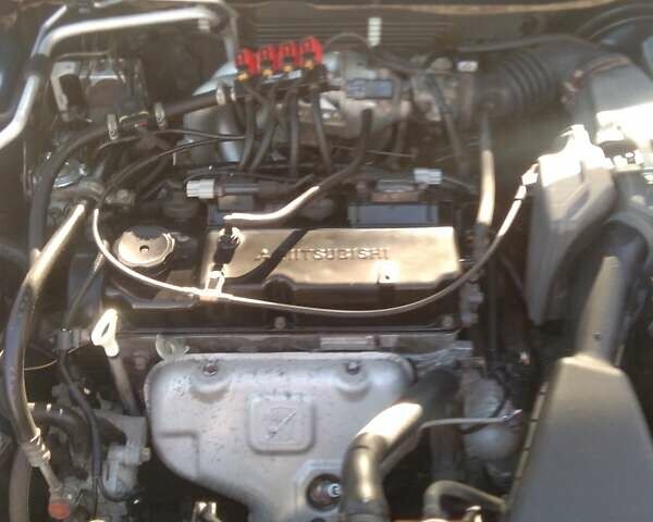 Синий Мицубиси Лансер, объемом двигателя 1.58 л и пробегом 195 тыс. км за 3990 $, фото 26 на Automoto.ua