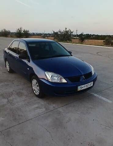 Синий Мицубиси Лансер, объемом двигателя 1.6 л и пробегом 263 тыс. км за 3400 $, фото 11 на Automoto.ua