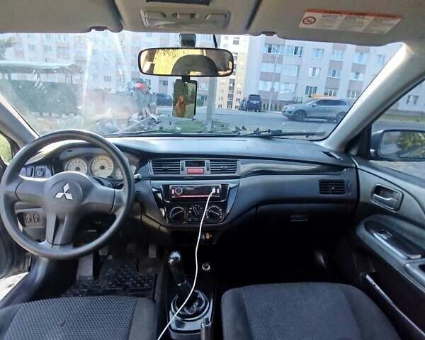 Синій Міцубісі Lancer, об'ємом двигуна 1.6 л та пробігом 290 тис. км за 4100 $, фото 2 на Automoto.ua