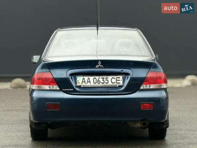 Синій Міцубісі Lancer, об'ємом двигуна 1.58 л та пробігом 513 тис. км за 2500 $, фото 14 на Automoto.ua