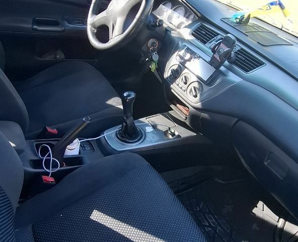 Синій Міцубісі Lancer, об'ємом двигуна 1.6 л та пробігом 267 тис. км за 3700 $, фото 10 на Automoto.ua