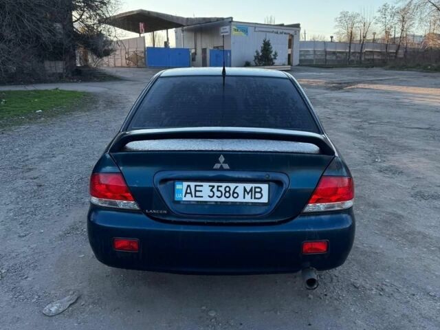 Синий Мицубиси Лансер, объемом двигателя 1.6 л и пробегом 330 тыс. км за 3999 $, фото 4 на Automoto.ua