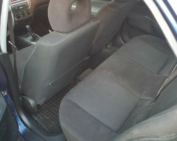 Синий Мицубиси Лансер, объемом двигателя 1.6 л и пробегом 360 тыс. км за 3000 $, фото 7 на Automoto.ua