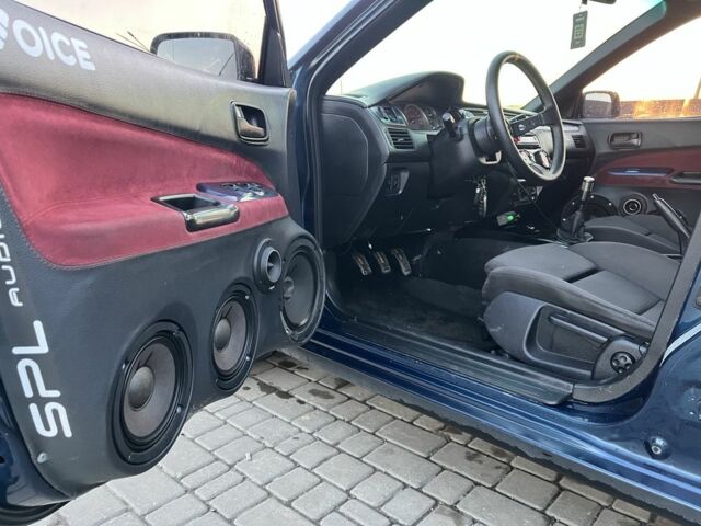 Синій Міцубісі Lancer, об'ємом двигуна 1.6 л та пробігом 241 тис. км за 5500 $, фото 16 на Automoto.ua