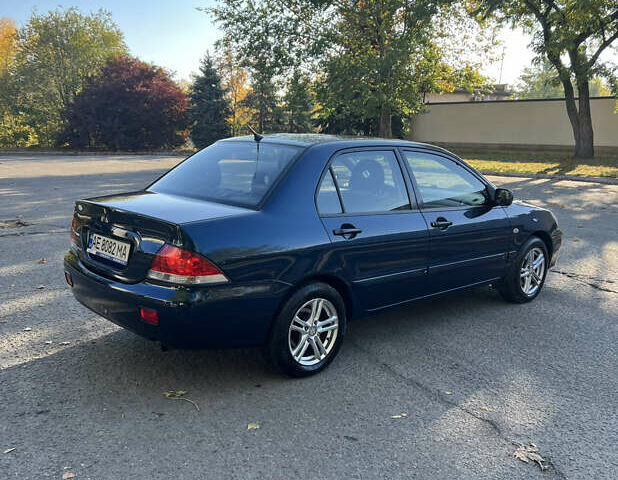 Міцубісі Lancer 2006 у Дніпро (Дніпропетровську) на Automoto.ua Синій Міцубісі Lancer, об'ємом двигуна 1.58 л та пробігом 284 тис. км за 4500 $, фото 2 на Automoto.ua