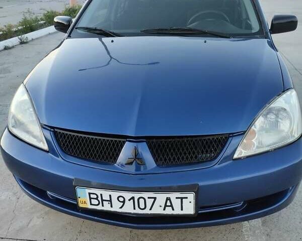 Синий Мицубиси Лансер, объемом двигателя 1.6 л и пробегом 263 тыс. км за 3400 $, фото 3 на Automoto.ua