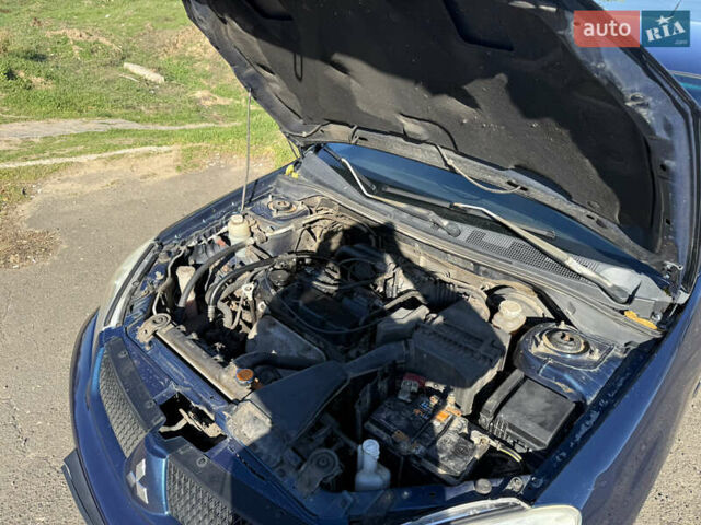 Синій Міцубісі Lancer, об'ємом двигуна 1.58 л та пробігом 269 тис. км за 3350 $, фото 28 на Automoto.ua