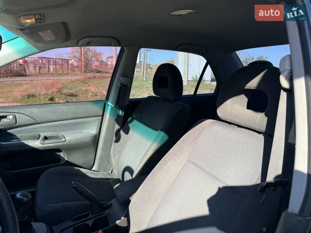 Синій Міцубісі Lancer, об'ємом двигуна 1.58 л та пробігом 269 тис. км за 3350 $, фото 9 на Automoto.ua