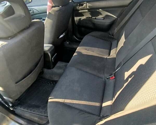 Синій Міцубісі Lancer, об'ємом двигуна 1.6 л та пробігом 290 тис. км за 4100 $, фото 7 на Automoto.ua