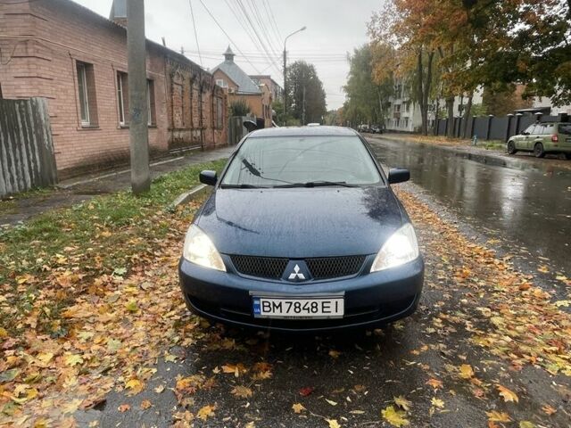 Синий Мицубиси Лансер, объемом двигателя 1.6 л и пробегом 179 тыс. км за 3800 $, фото 2 на Automoto.ua