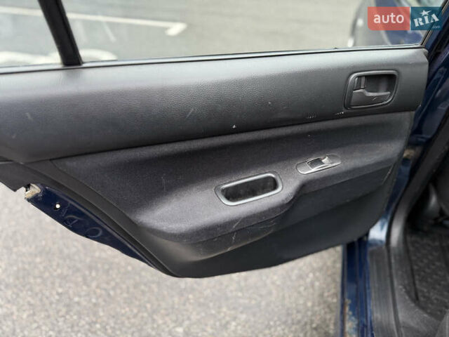 Синій Міцубісі Lancer, об'ємом двигуна 1.58 л та пробігом 513 тис. км за 2500 $, фото 17 на Automoto.ua
