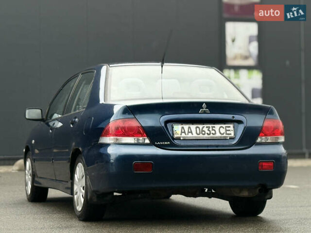 Синій Міцубісі Lancer, об'ємом двигуна 1.58 л та пробігом 513 тис. км за 2500 $, фото 13 на Automoto.ua